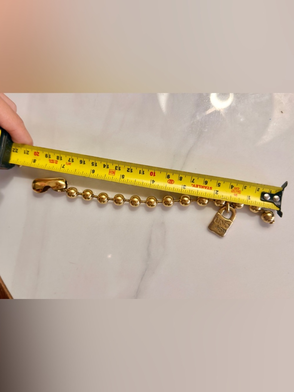 UNO de 50 Gold Bead Bracelet with Padlock Charm (authentic). - Picture 2 of 2